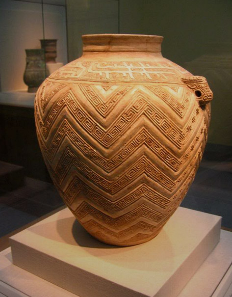 Egyptian-terracotta-pot with geometric surface pattern and twin lugs