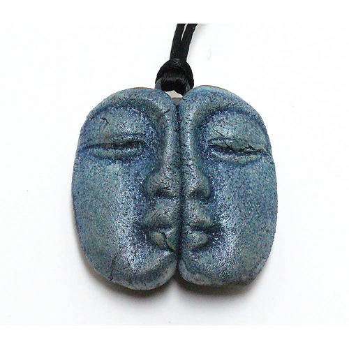 Ceramic Buddha face pendant by Anita Feng