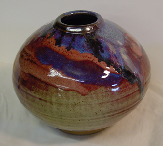 ancient ceramic glazes by David Fry - copper red glaze overlaid with ash and iron.