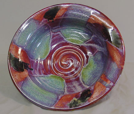 glazed plate by David Fry with red-purple-blue and green glaze
