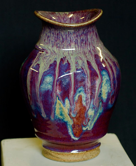 shaped vase rich mix of wood ash and iron over a copper red glaze - David Fry