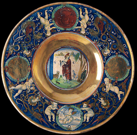 Large-dish-with-St.-Lazarus-surrounded-by-a-wide-border-of-grotesque-ornament,-putti-and-four-medallions