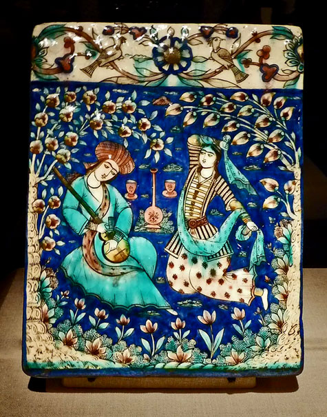 Persian-Tile decorated with a minstrel serenading a girl