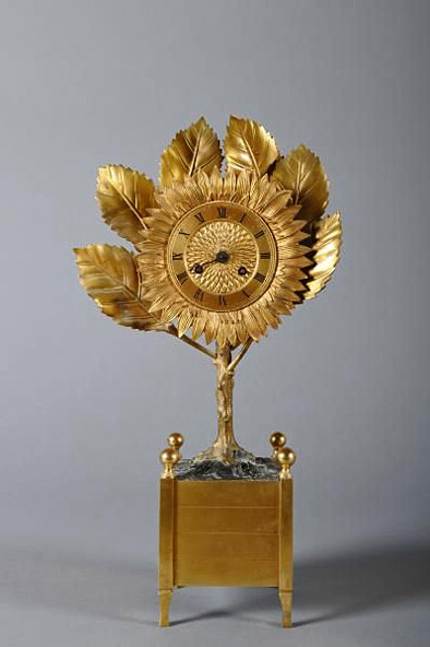 pendulum-called-'sunflower'-engraved-bronze,-patinated-and-gilt