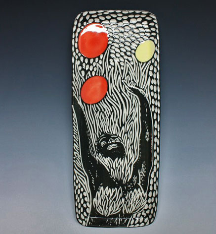 Shoshona Snow sgraffito tray in black and white with red and yellow 