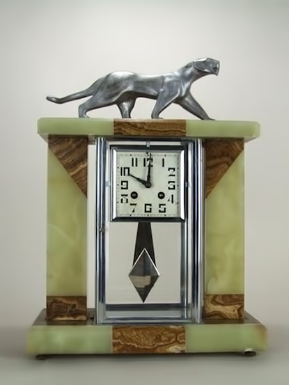 stylised-silvered-bronze-4-glass-clock-is-an-unsigned-piece-by-the-female-Belgian-artist-Decoux