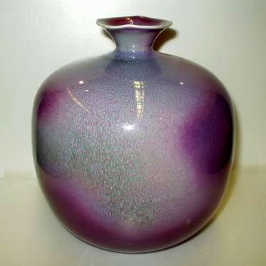Sperical vase with small flared neck in lavender and purple 