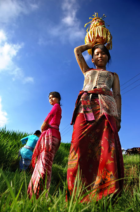 Balinese women making an offering