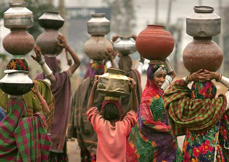Rajastani women with pots