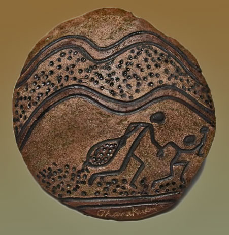 Thanakupi_Man-in-canoe clay sphere