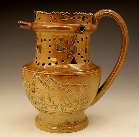 Amber antique ceramic puzzle jug