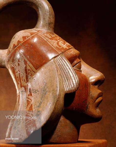 Stirrup-spouted-Mochica-portrait-jar-depicting-a-face-of-a-nobleman--600AD