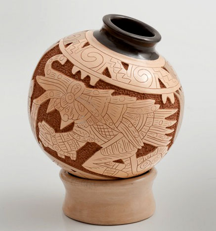 Peruvian ceramic vessel-437px-467px.jpg Peruvian ceramic vessel with carved decoartion