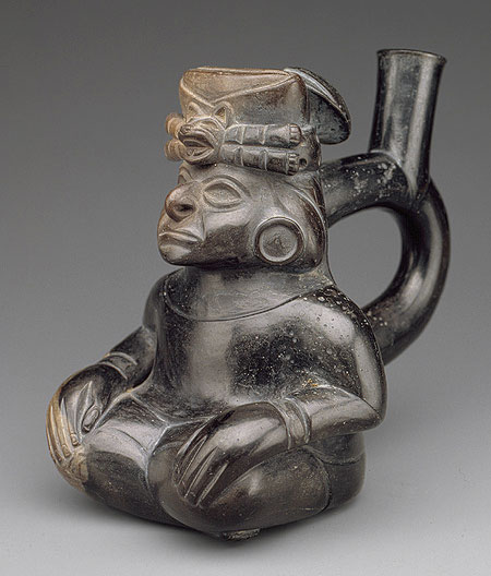 Moche seated figure bottle from Peru