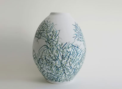 ovoid ceramic vessel with blue on white botanical decoration by Mitsuo Shoji