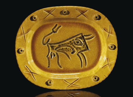 Mustard ovoid plate with bull motif by Picasso