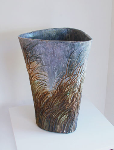 Jeff Mincham flared vase form with reed decorative theme