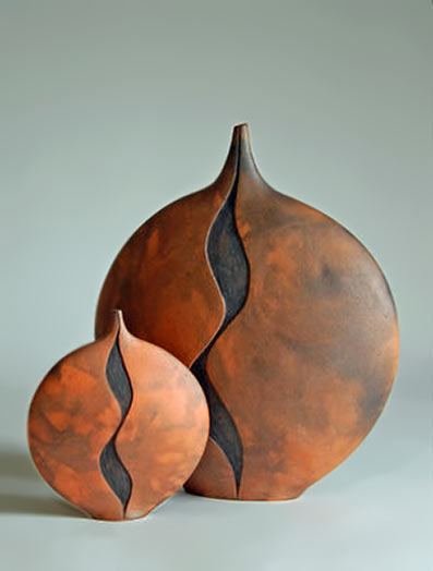 Ann-Wilson-Ceramics - pair of ceramic vessels with abstract motif in black on a rusty orange