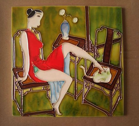 Ceramic tile featuring Asian girl in a red dress touching a cat with her toe