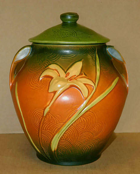 Roseville cookie jar with flower decorative motif