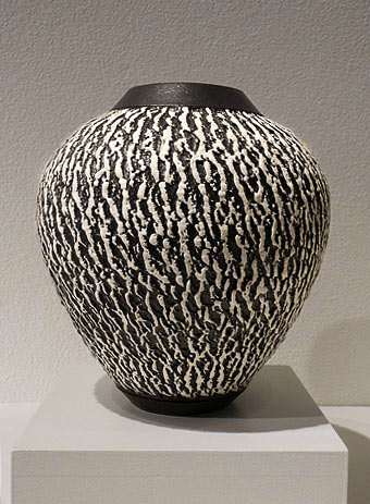 Black and white surafce textured vessel