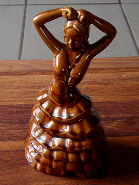 Flamenco dancer sculpture in a brown glazed ceramic