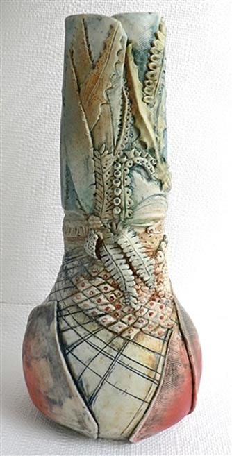 Elaine-Hind pastel coloured vase with incies and carved decoration