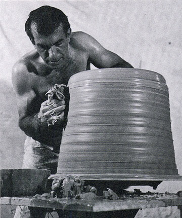 Peter Voulkos throwing clay on a pottery wheel