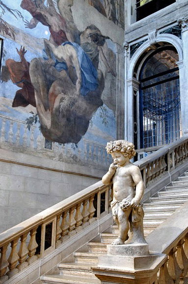 Staircase at Ca Segredo Hotel, Venice. with cherub statue
