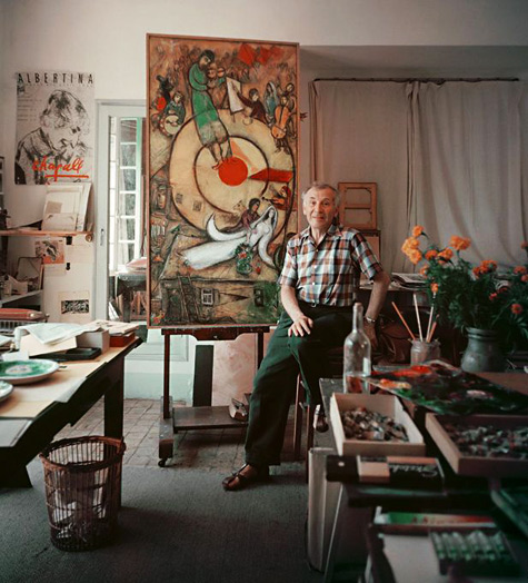 Marc Chagall painting in his studio, France, 1955. Photo by Mark Shaw. 