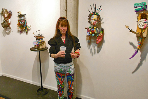 Keri-Joy-Colestock with her wall sculptures