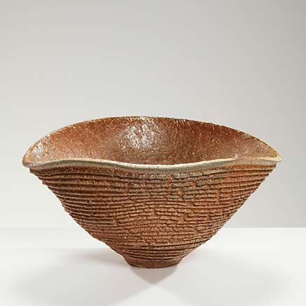 horizontally ribbed bowl, wavy cone shape