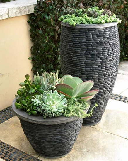 riverstone planters with succulents