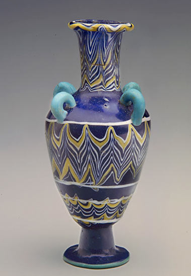 Egyptian glass vessel four handles