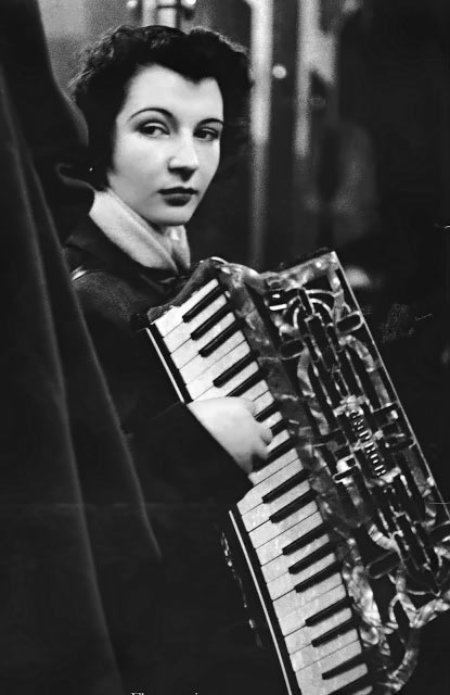 French photography Robert Doisneau - a female street accordionist