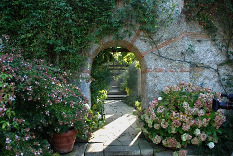 Archway in French garden designed by English garden designer Gertrude Jekyll and architect Edwin Lutyens