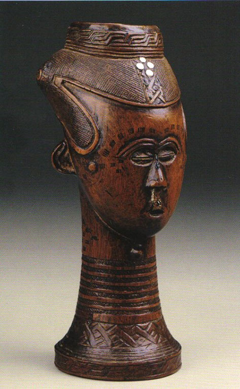 A female head sculptured palm wine drinking cup from Niger 