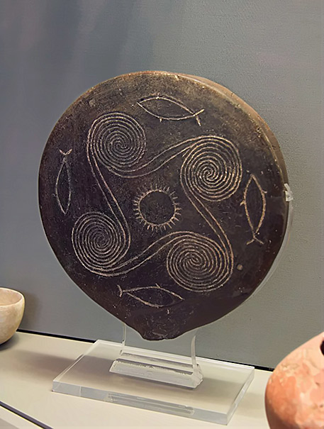 Minoan pottery -- frying pan with characteristic decorative spirals.