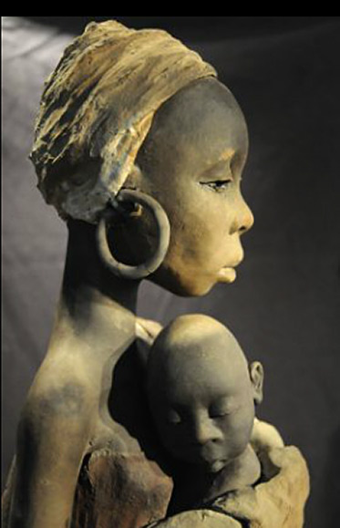 Michele Ludwiczak - African lady holding her child sculpture 