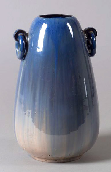 Fulper Pottery - Blue flambe glaze on swelling cylindrical form shading to soft pink at base,