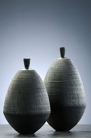Christiane-Wilhelm two lidded ceramic jars