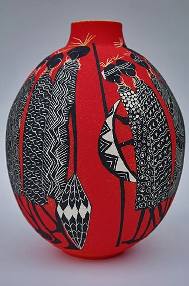 Marilyn-Wheeler---African-Jar red ceramic vessel with motif of African figures