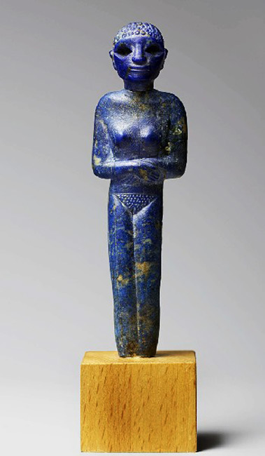 Egyptian statuette standing woman
