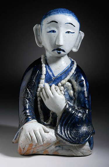 Seated Monk LACMA Korea, Joseon dynasty (1392-1910), 18th-19th century Sculpture Molded stoneware with underglaze blue and clear glaze