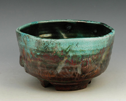 -Raku-fired-Chawan.-This-pieces-was-fired-with-a-copper-bearing-glaze-that-ages-and-mellows-as-it-gets-older.-non-functional.-Decorative-use-only
