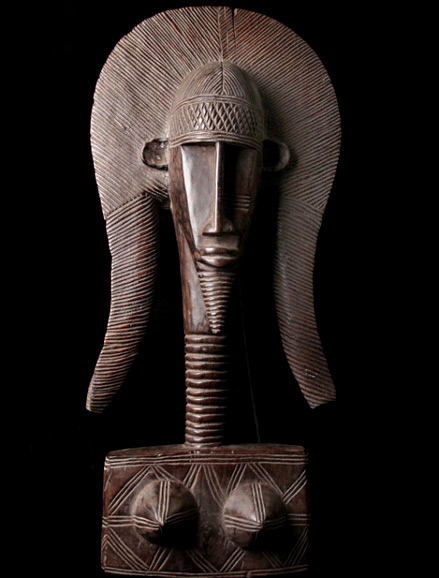 Bambara Wood carved statue with a face on each side