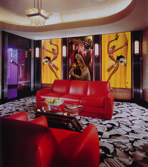 Art Deco theatre with Josephine Baker and Louis Armstrong wall panels.