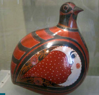 red, black and white ceramic bird from Mexico