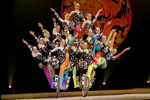 Chinese National Circus acrobats on momcycles