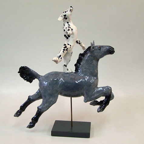 Andree-Richmond dog standing on horseback